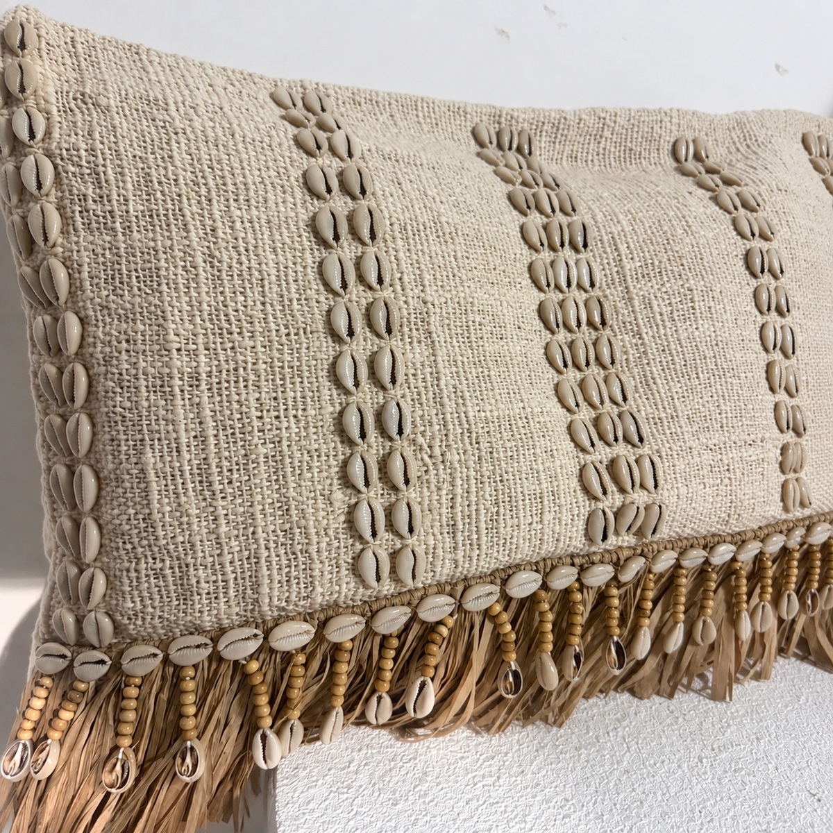Sundara Cowrie Shell Raffia Cushion – 50 × 30cm